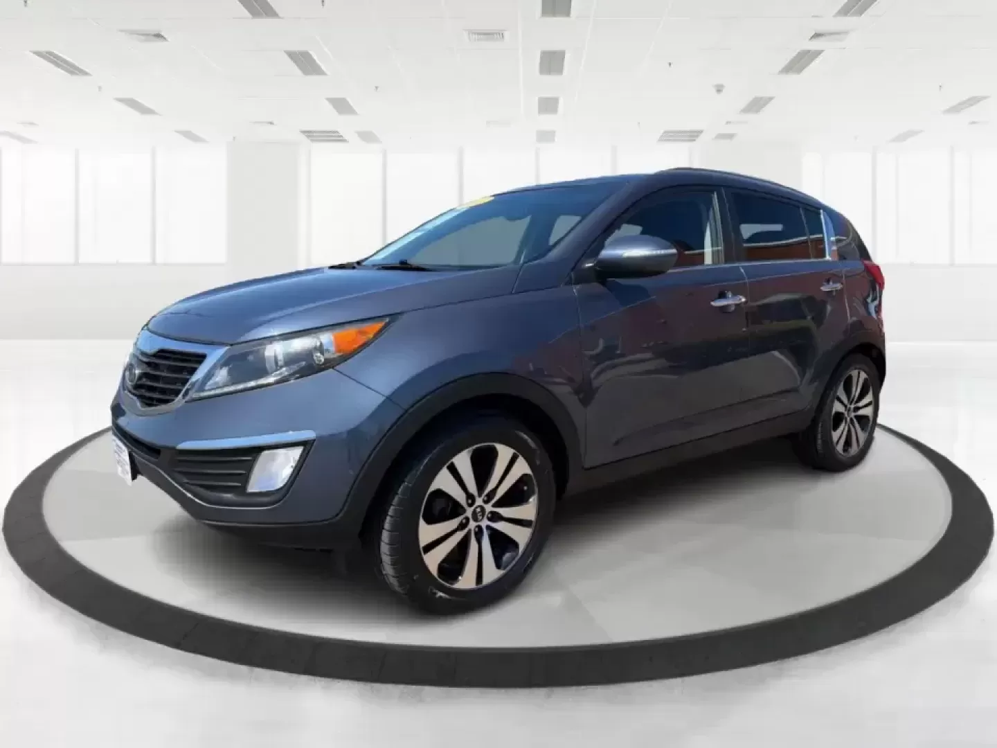 2012 Kia Sportage EX (KNDPC3A28C7) with an 2.4L I-4 DOHC engine, 6-Speed Automatic transmission, located at 880 E. National Road, Vandalia, OH, 45377, (937) 908-9800, 39.891918, -84.183594 - Picture your next week done right: an easy commute down I75, quick school drop-offs, a grocery run in the rain, and a spontaneous weekend trip to Taylorsville MetroPark-all in a compact SUV that feels comfortable, confident, and practical. This 2012 Kia Sportage EX in Twilight Blue is a smart fit fo - Photo#8