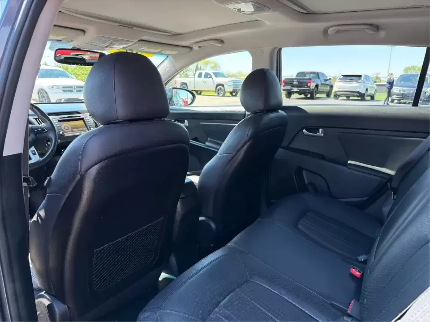 2012 Kia Sportage EX (KNDPC3A28C7) with an 2.4L I-4 DOHC engine, 6-Speed Automatic transmission, located at 880 E. National Road, Vandalia, OH, 45377, (937) 908-9800, 39.891918, -84.183594 - Picture your next week done right: an easy commute down I75, quick school drop-offs, a grocery run in the rain, and a spontaneous weekend trip to Taylorsville MetroPark-all in a compact SUV that feels comfortable, confident, and practical. This 2012 Kia Sportage EX in Twilight Blue is a smart fit fo - Photo#10