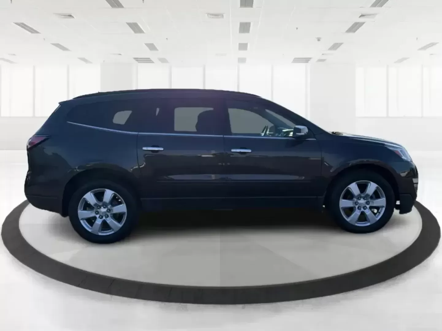 2017 Chevrolet Traverse 1LT (1GNKRGKD6HJ) with an 3.6L V-6 gasoline direct injection engine, 6A transmission, located at 8750 N County Rd 25A, Piqua, OH, 45356, (937) 908-9800, 40.164391, -84.232513 - Road trips to Indian Lake, busy school mornings, and comfortable daily commutes down I75 are exactly what this SUV was built for. If you need a three-row family hauler that still feels confident and composed on Ohio back roads, this **2017 Chevrolet Traverse 1LT** in **Tungsten Metallic** delivers t - Photo#1