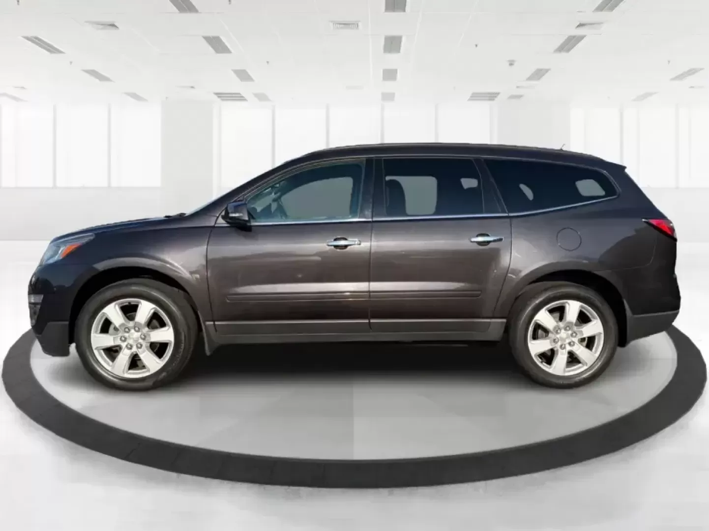 2017 Chevrolet Traverse 1LT (1GNKRGKD6HJ) with an 3.6L V-6 gasoline direct injection engine, 6A transmission, located at 8750 N County Rd 25A, Piqua, OH, 45356, (937) 908-9800, 40.164391, -84.232513 - Road trips to Indian Lake, busy school mornings, and comfortable daily commutes down I75 are exactly what this SUV was built for. If you need a three-row family hauler that still feels confident and composed on Ohio back roads, this **2017 Chevrolet Traverse 1LT** in **Tungsten Metallic** delivers t - Photo#5