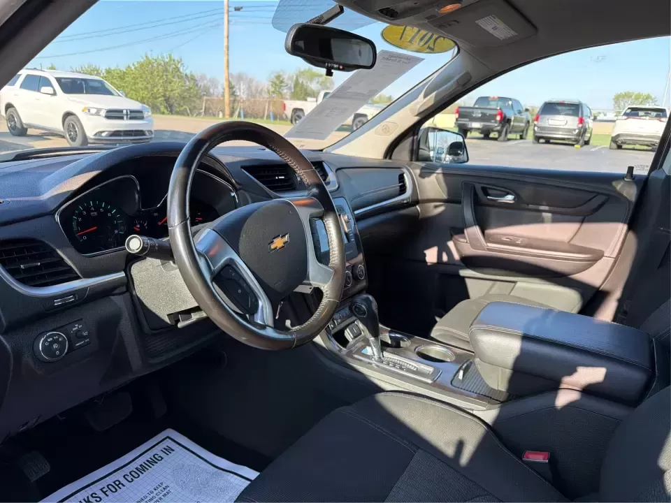 2017 Chevrolet Traverse 1LT (1GNKRGKD6HJ) with an 3.6L V-6 gasoline direct injection engine, 6A transmission, located at 8750 N County Rd 25A, Piqua, OH, 45356, (937) 908-9800, 40.164391, -84.232513 - Road trips to Indian Lake, busy school mornings, and comfortable daily commutes down I75 are exactly what this SUV was built for. If you need a three-row family hauler that still feels confident and composed on Ohio back roads, this **2017 Chevrolet Traverse 1LT** in **Tungsten Metallic** delivers t - Photo#9