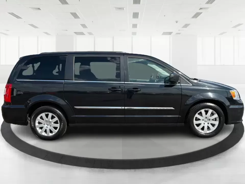 2016 Chrysler Town and Country Touring (2C4RC1BGXGR) with an Pentastar 3.6L V-6 DOHC engine, 6A transmission, located at 1230 East Main St, Xenia, OH, 45385, (937) 908-9800, 39.688026, -83.910172 - Life gets busy fast-school drop-offs, long commutes, weekend tournaments, and the occasional road trip to reset. The 2016 Chrysler Town and Country Touring is built for that real-life rhythm, giving you minivan practicality with comfort features that make every mile easier. Finished in Brilliant B - Photo#1