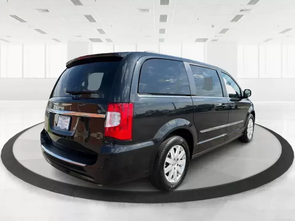 2016 Chrysler Town and Country Touring (2C4RC1BGXGR) with an Pentastar 3.6L V-6 DOHC engine, 6A transmission, located at 1184 Kauffman Ave, Fairborn, OH, 45324, (937) 908-9800, 39.807072, -84.030914 - Life gets busy fast-school drop-offs, long commutes, weekend tournaments, and the occasional road trip to reset. The 2016 Chrysler Town and Country Touring is built for that real-life rhythm, giving you minivan practicality with comfort features that make every mile easier. Finished in Brilliant B - Photo#2