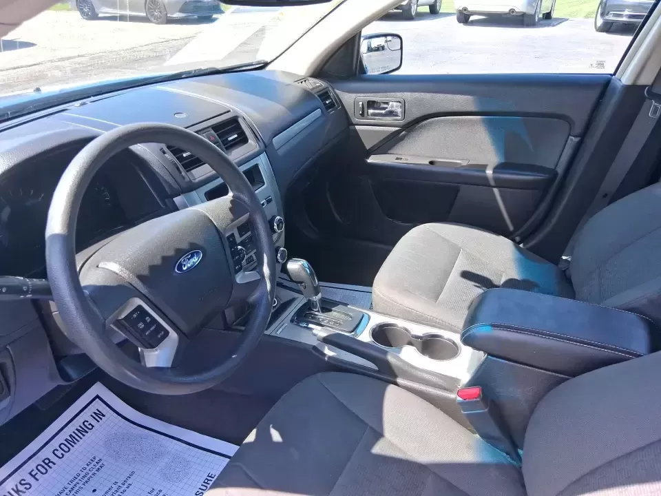 2012 Ford Fusion SE (3FAHP0HAXCR) with an 2.5L L4 DOHC 16V engine, located at 1099 N County Rd 25A , Troy, OH, 45373, (937) 908-9800, 40.057079, -84.212883 - Need a dependable sedan that makes everyday life easier-whether you're commuting down I-75 to Dayton, running errands around Troy, or planning a weekend drive past the Miami River and downtown's shops and festivals? This 2012 Ford Fusion SE in Blue Flame Metallic is a smart, comfortable choice for b - Photo#9