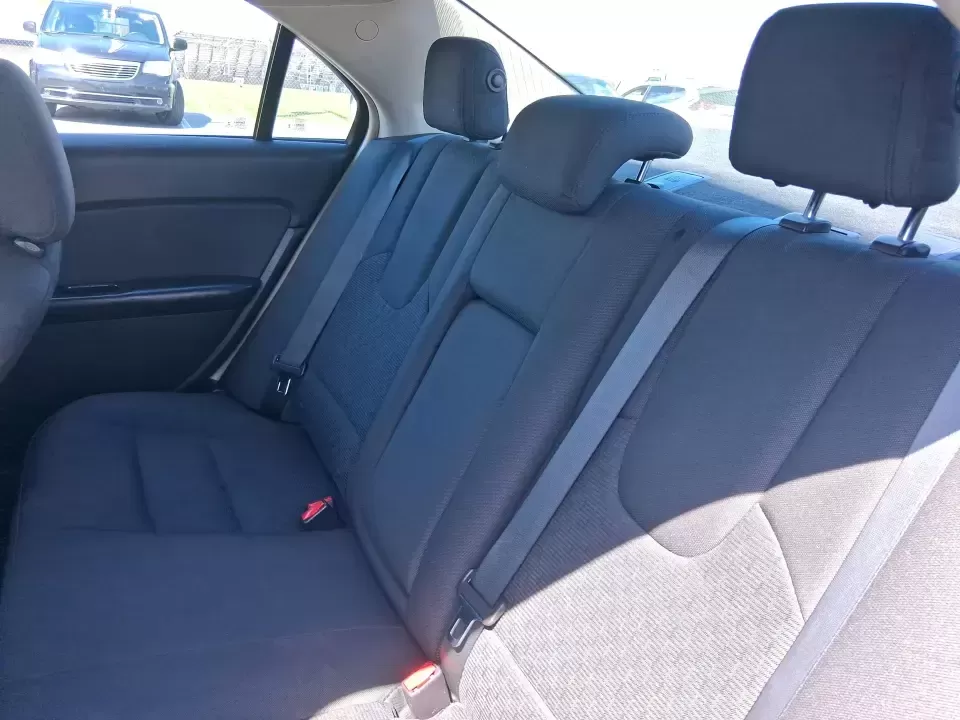 2012 Ford Fusion SE (3FAHP0HAXCR) with an 2.5L L4 DOHC 16V engine, located at 1099 N County Rd 25A , Troy, OH, 45373, (937) 908-9800, 40.057079, -84.212883 - Need a dependable sedan that makes everyday life easier-whether you're commuting down I-75 to Dayton, running errands around Troy, or planning a weekend drive past the Miami River and downtown's shops and festivals? This 2012 Ford Fusion SE in Blue Flame Metallic is a smart, comfortable choice for b - Photo#10