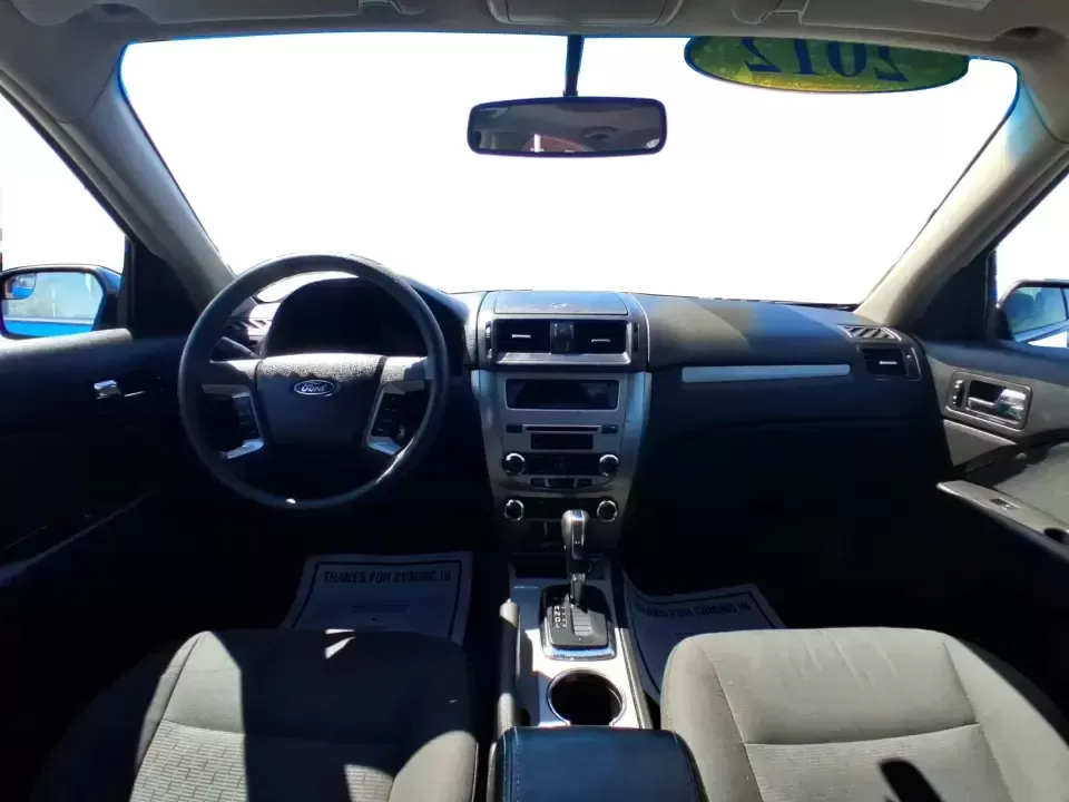 2012 Ford Fusion SE (3FAHP0HAXCR) with an 2.5L L4 DOHC 16V engine, located at 1099 N County Rd 25A , Troy, OH, 45373, (937) 908-9800, 40.057079, -84.212883 - Need a dependable sedan that makes everyday life easier-whether you're commuting down I-75 to Dayton, running errands around Troy, or planning a weekend drive past the Miami River and downtown's shops and festivals? This 2012 Ford Fusion SE in Blue Flame Metallic is a smart, comfortable choice for b - Photo#21