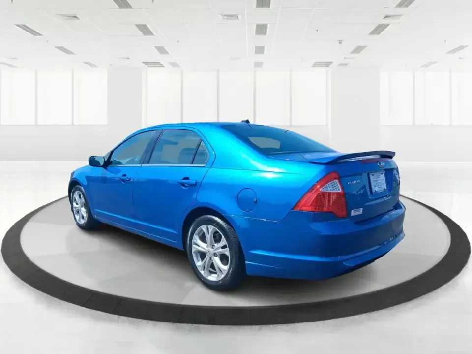 2012 Ford Fusion SE (3FAHP0HAXCR) with an 2.5L L4 DOHC 16V engine, located at 1230 East Main St, Xenia, OH, 45385, (937) 908-9800, 39.688026, -83.910172 - Need a dependable sedan that makes everyday life easier-whether you're commuting down I-75 to Dayton, running errands around Troy, or planning a weekend drive past the Miami River and downtown's shops and festivals? This 2012 Ford Fusion SE in Blue Flame Metallic is a smart, comfortable choice for b - Photo#4