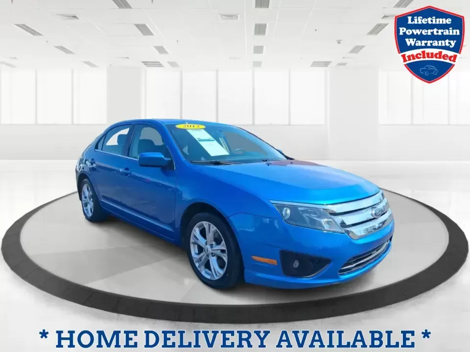 2012 Ford Fusion SE (3FAHP0HAXCR) with an 2.5L L4 DOHC 16V engine, located at 8750 N County Rd 25A, Piqua, OH, 45356, (937) 908-9800, 40.164391, -84.232513 - Need a dependable sedan that makes everyday life easier-whether you're commuting down I-75 to Dayton, running errands around Troy, or planning a weekend drive past the Miami River and downtown's shops and festivals? This 2012 Ford Fusion SE in Blue Flame Metallic is a smart, comfortable choice for b - Photo#0