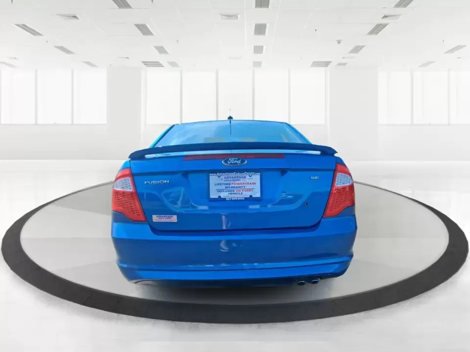 2012 Ford Fusion SE (3FAHP0HAXCR) with an 2.5L L4 DOHC 16V engine, located at 8750 N County Rd 25A, Piqua, OH, 45356, (937) 908-9800, 40.164391, -84.232513 - Need a dependable sedan that makes everyday life easier-whether you're commuting down I-75 to Dayton, running errands around Troy, or planning a weekend drive past the Miami River and downtown's shops and festivals? This 2012 Ford Fusion SE in Blue Flame Metallic is a smart, comfortable choice for b - Photo#3