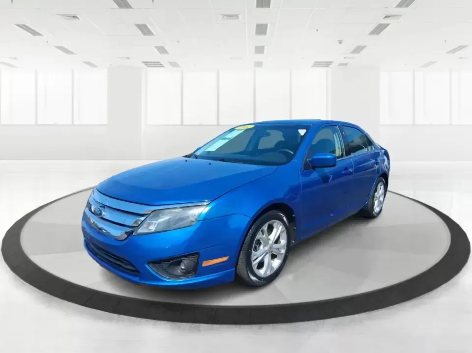 2012 Ford Fusion SE (3FAHP0HAXCR) with an 2.5L L4 DOHC 16V engine, located at 8750 N County Rd 25A, Piqua, OH, 45356, (937) 908-9800, 40.164391, -84.232513 - Need a dependable sedan that makes everyday life easier-whether you're commuting down I-75 to Dayton, running errands around Troy, or planning a weekend drive past the Miami River and downtown's shops and festivals? This 2012 Ford Fusion SE in Blue Flame Metallic is a smart, comfortable choice for b - Photo#8