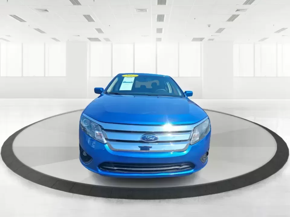 2012 Ford Fusion SE (3FAHP0HAXCR) with an 2.5L L4 DOHC 16V engine, located at 401 Woodman Dr, Riverside, OH, 45431, (937) 908-9800, 39.760899, -84.123421 - Need a dependable sedan that makes everyday life easier-whether you're commuting down I-75 to Dayton, running errands around Troy, or planning a weekend drive past the Miami River and downtown's shops and festivals? This 2012 Ford Fusion SE in Blue Flame Metallic is a smart, comfortable choice for b - Photo#7