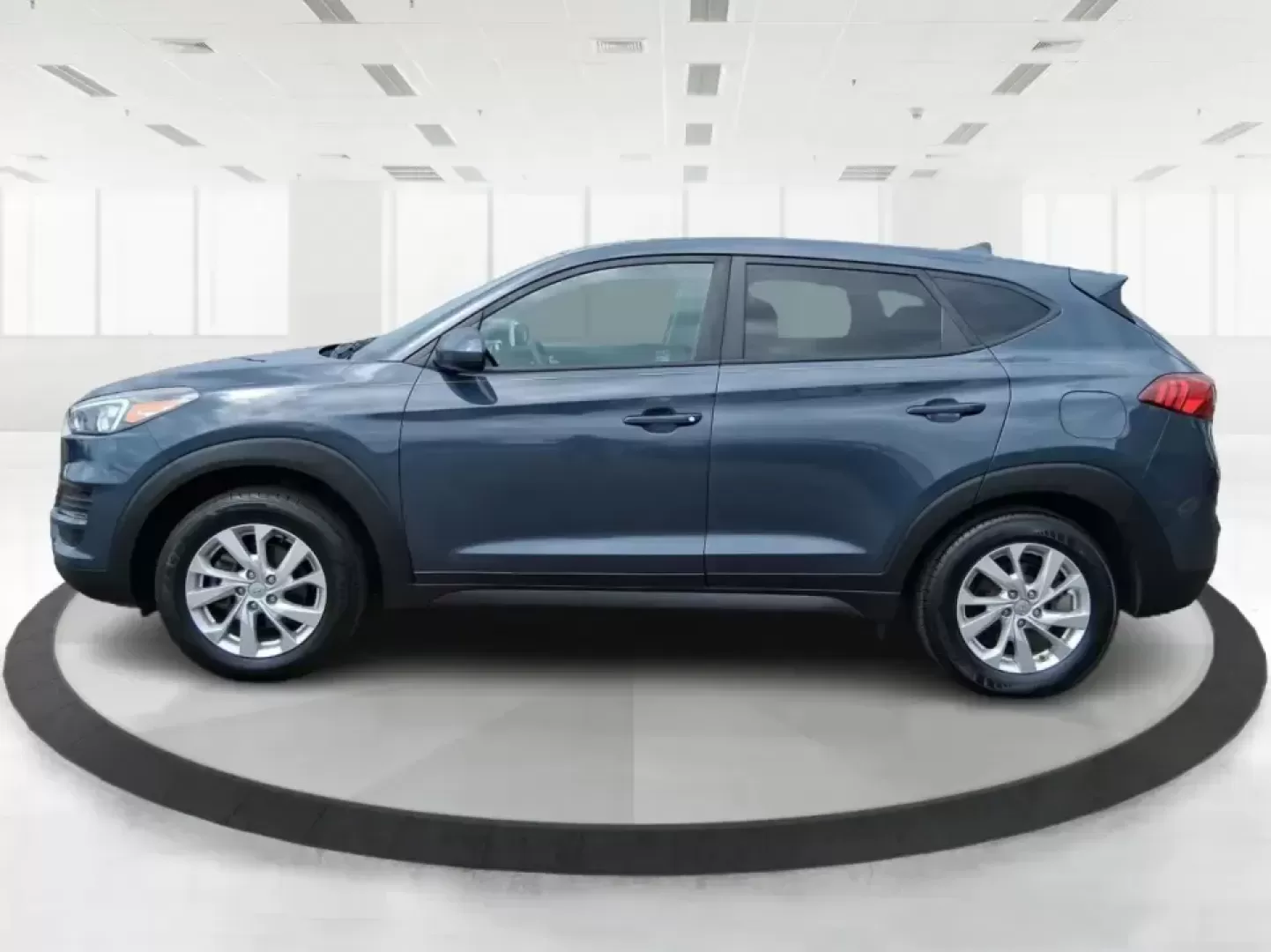 2019 Hyundai Tucson SE (KM8J23A41KU) with an Nu 2L I-4 gasoline direct injection engine, 6A transmission, located at 8750 N County Rd 25A, Piqua, OH, 45356, (937) 908-9800, 40.164391, -84.232513 - Need a practical SUV that can handle the daily school run, a long commute up I75, and weekend trips to the Miami Valley without draining your budget? This 2019 Hyundai Tucson SE in eye-catching Dusk Blue is built for real life in Piqua, Ohio-easy to park, comfortable for passengers, and ready for ev - Photo#5