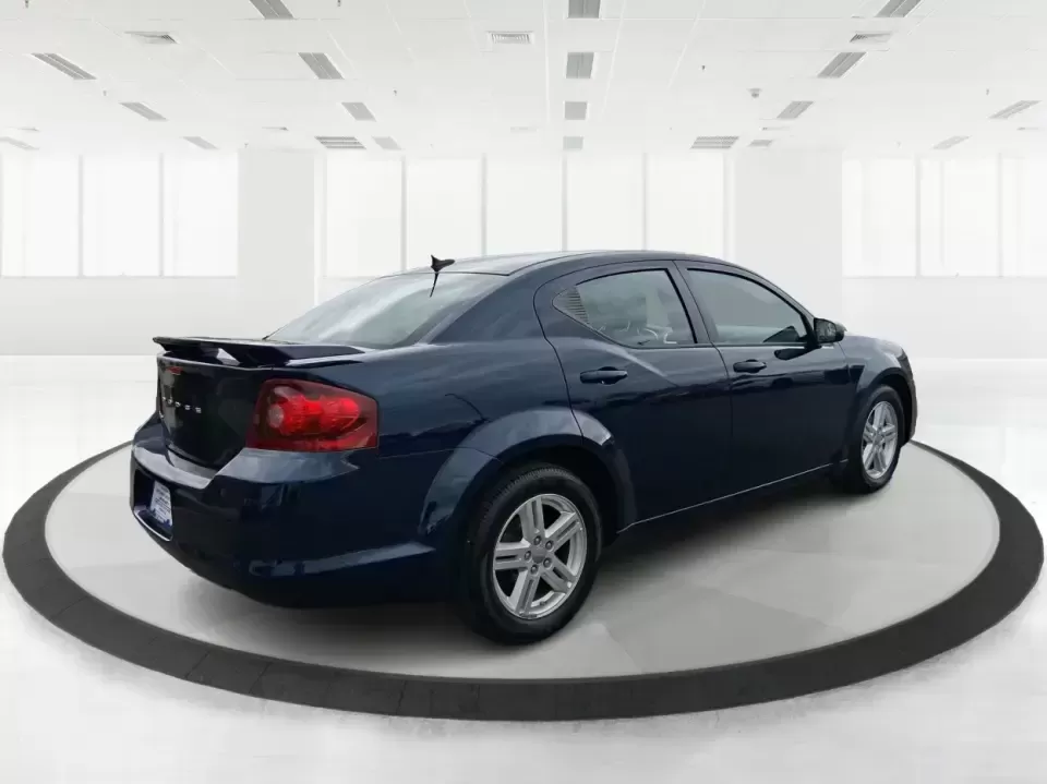 2014 Dodge Avenger SE (1C3CDZAG6EN) with an 3.6L V6 DOHC 24V FFV engine, 6-Speed Automatic transmission, located at 880 E. National Road, Vandalia, OH, 45377, (937) 908-9800, 39.891918, -84.183594 - Need a dependable commuter that still feels fun on I75, roomy enough for family errands, and confident for weekend drives to the National Museum of the U.S. Air Force? This 2014 Dodge Avenger SE in eye-catching True Blue Pearlcoat delivers the kind of real-world versatility Vandalia drivers want-com - Photo#2