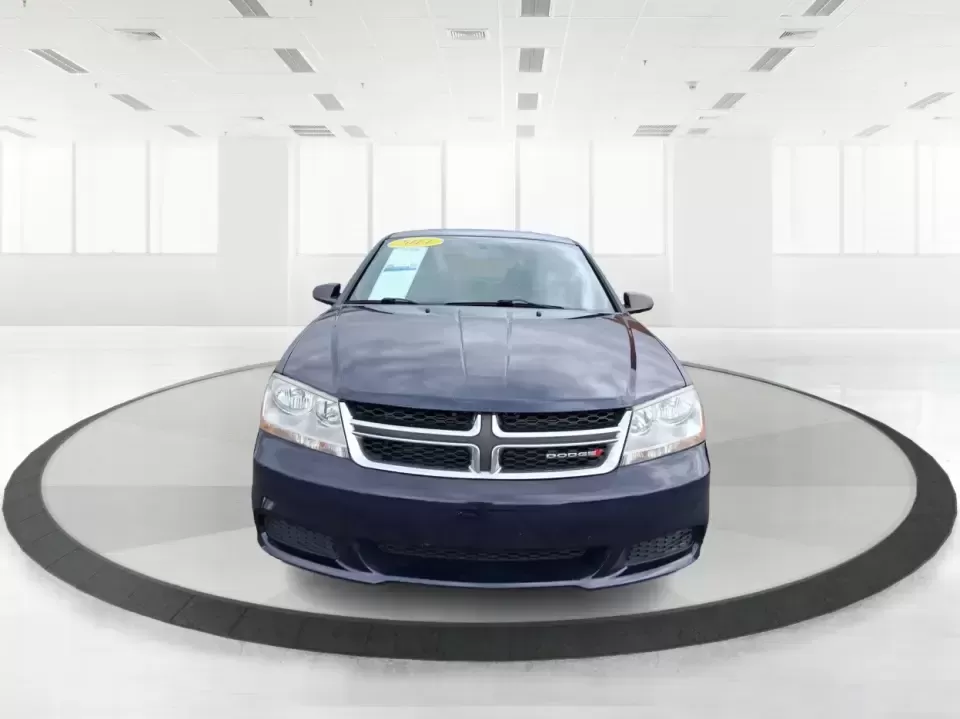 2014 Dodge Avenger SE (1C3CDZAG6EN) with an 3.6L V6 DOHC 24V FFV engine, 6-Speed Automatic transmission, located at 880 E. National Road, Vandalia, OH, 45377, (937) 908-9800, 39.891918, -84.183594 - Need a dependable commuter that still feels fun on I75, roomy enough for family errands, and confident for weekend drives to the National Museum of the U.S. Air Force? This 2014 Dodge Avenger SE in eye-catching True Blue Pearlcoat delivers the kind of real-world versatility Vandalia drivers want-com - Photo#7
