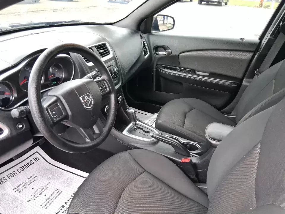 2014 Dodge Avenger SE (1C3CDZAG6EN) with an 3.6L V6 DOHC 24V FFV engine, 6-Speed Automatic transmission, located at 880 E. National Road, Vandalia, OH, 45377, (937) 908-9800, 39.891918, -84.183594 - Need a dependable commuter that still feels fun on I75, roomy enough for family errands, and confident for weekend drives to the National Museum of the U.S. Air Force? This 2014 Dodge Avenger SE in eye-catching True Blue Pearlcoat delivers the kind of real-world versatility Vandalia drivers want-com - Photo#9