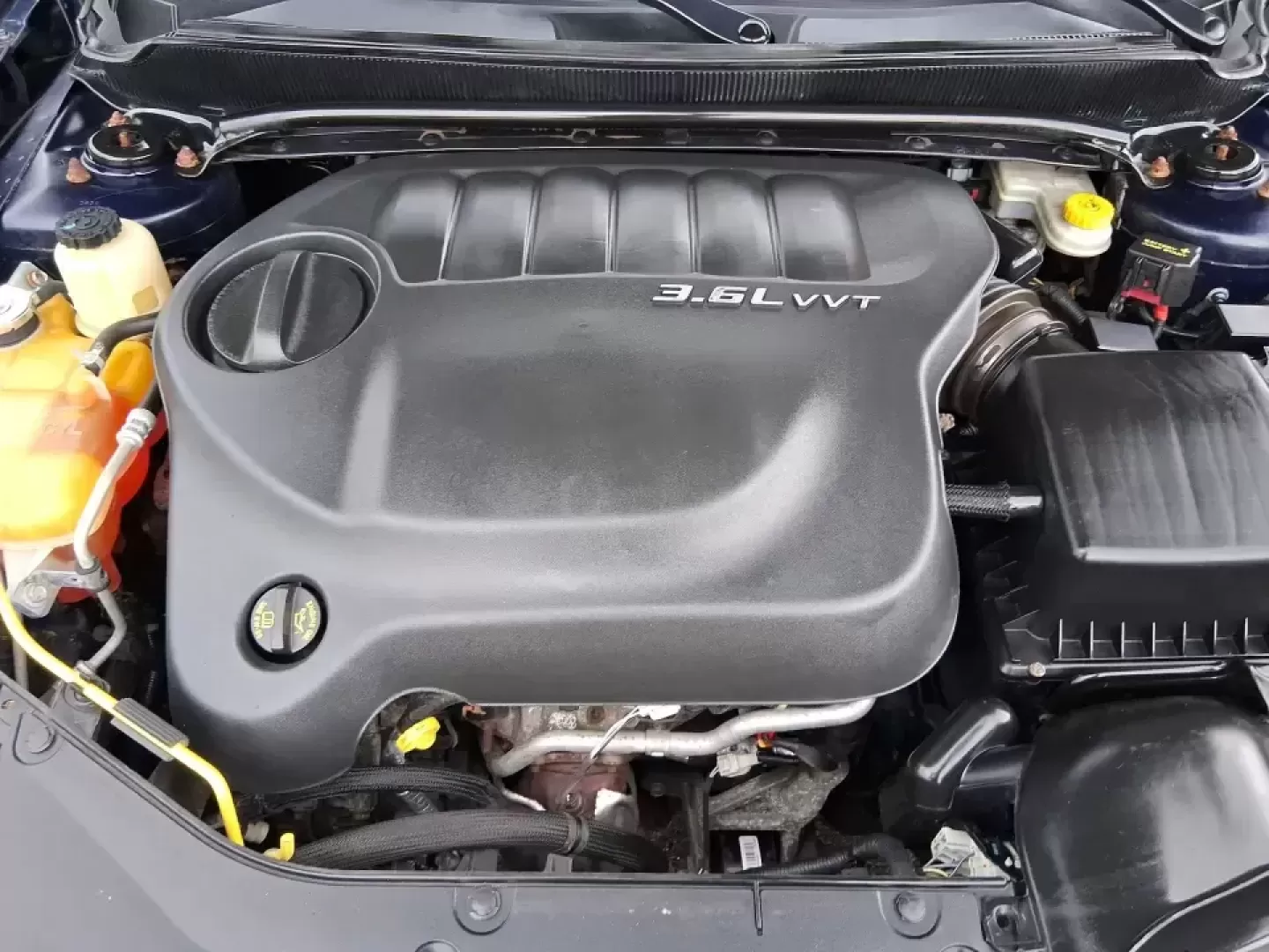 2014 Dodge Avenger SE (1C3CDZAG6EN) with an 3.6L V6 DOHC 24V FFV engine, 6-Speed Automatic transmission, located at 880 E. National Road, Vandalia, OH, 45377, (937) 908-9800, 39.891918, -84.183594 - Need a dependable commuter that still feels fun on I75, roomy enough for family errands, and confident for weekend drives to the National Museum of the U.S. Air Force? This 2014 Dodge Avenger SE in eye-catching True Blue Pearlcoat delivers the kind of real-world versatility Vandalia drivers want-com - Photo#11