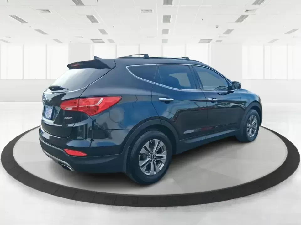 2015 Hyundai Santa Fe 2.4L (5XYZU3LB1FG) with an Theta II 2.4L I-4 gasoline direct injection engine, 6-Speed Automatic transmission, located at 1099 N County Rd 25A , Troy, OH, 45373, (937) 908-9800, 40.057079, -84.212883 - Pack up the kids for a weekend at Treasure Island Park, load the cooler for a day on the Great Miami River, or settle into a comfortable daily commute down I75-this 2015 Hyundai Santa Fe 2.4L is the kind of practical SUV that fits real life in Troy. With confident road manners, flexible cargo space, - Photo#2