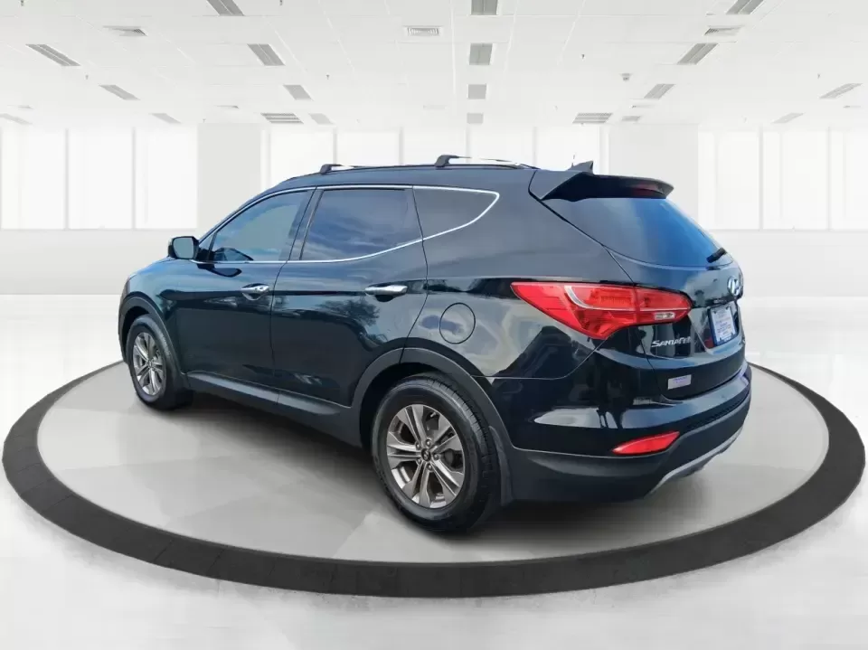 2015 Hyundai Santa Fe 2.4L (5XYZU3LB1FG) with an Theta II 2.4L I-4 gasoline direct injection engine, 6-Speed Automatic transmission, located at 1099 N County Rd 25A , Troy, OH, 45373, (937) 908-9800, 40.057079, -84.212883 - Pack up the kids for a weekend at Treasure Island Park, load the cooler for a day on the Great Miami River, or settle into a comfortable daily commute down I75-this 2015 Hyundai Santa Fe 2.4L is the kind of practical SUV that fits real life in Troy. With confident road manners, flexible cargo space, - Photo#4