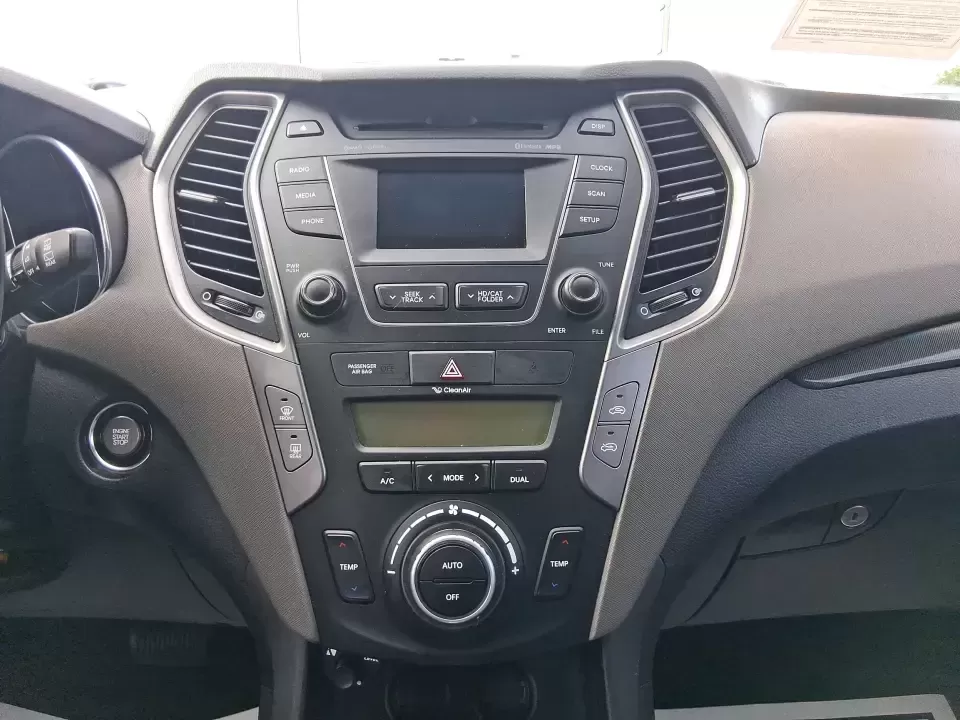 2015 Hyundai Santa Fe 2.4L (5XYZU3LB1FG) with an Theta II 2.4L I-4 gasoline direct injection engine, 6-Speed Automatic transmission, located at 1099 N County Rd 25A , Troy, OH, 45373, (937) 908-9800, 40.057079, -84.212883 - Pack up the kids for a weekend at Treasure Island Park, load the cooler for a day on the Great Miami River, or settle into a comfortable daily commute down I75-this 2015 Hyundai Santa Fe 2.4L is the kind of practical SUV that fits real life in Troy. With confident road manners, flexible cargo space, - Photo#13