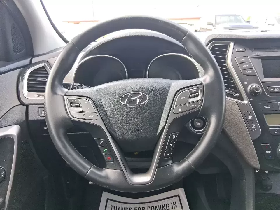 2015 Hyundai Santa Fe 2.4L (5XYZU3LB1FG) with an Theta II 2.4L I-4 gasoline direct injection engine, 6-Speed Automatic transmission, located at 1099 N County Rd 25A , Troy, OH, 45373, (937) 908-9800, 40.057079, -84.212883 - Pack up the kids for a weekend at Treasure Island Park, load the cooler for a day on the Great Miami River, or settle into a comfortable daily commute down I75-this 2015 Hyundai Santa Fe 2.4L is the kind of practical SUV that fits real life in Troy. With confident road manners, flexible cargo space, - Photo#16