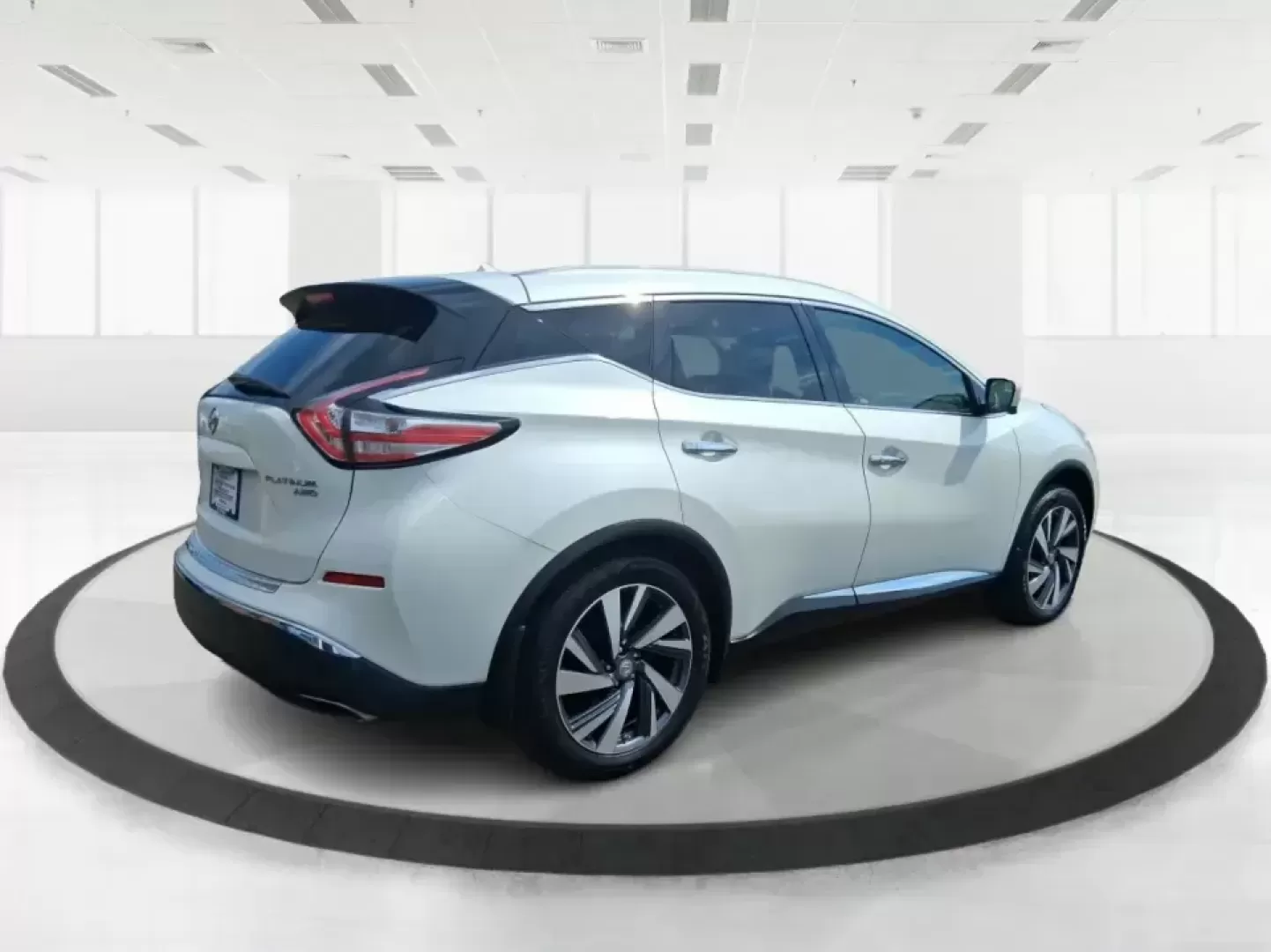 2015 Nissan Murano Platinum (5N1AZ2MH3FN) with an 3.5L V-6 DOHC engine, Continuously Variable Transmission transmission, located at 1951 S Dayton Lakeview Rd., New Carlisle, OH, 45344, (937) 908-9800, 39.890999, -84.050255 - Need one SUV that can handle the weekday commute, keep everyone comfortable on family errands, and still feel upscale for a weekend getaway to John Bryan State Park or a day trip through Dayton? This 2015 Nissan Murano Platinum AWD in Pearl White is built for exactly that kind of real-life driving-s - Photo#2