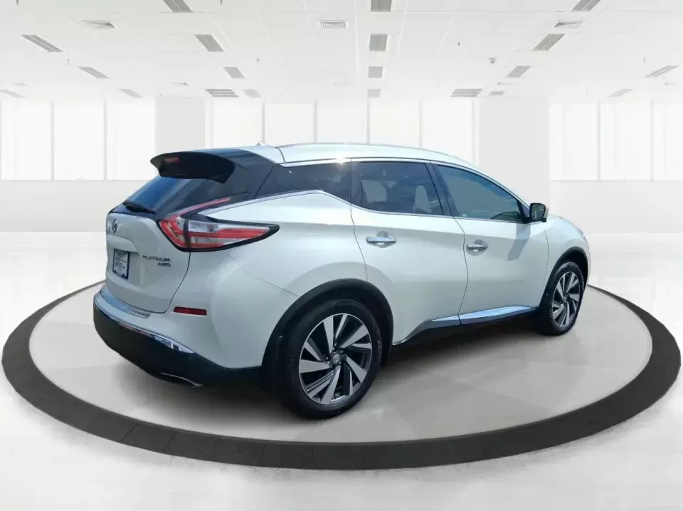 2015 Nissan Murano Platinum (5N1AZ2MH3FN) with an 3.5L V-6 DOHC engine, Continuously Variable Transmission transmission, located at 1951 S Dayton Lakeview Rd., New Carlisle, OH, 45344, (937) 908-9800, 39.890999, -84.050255 - Need one SUV that can handle the weekday commute, keep everyone comfortable on family errands, and still feel upscale for a weekend getaway to John Bryan State Park or a day trip through Dayton? This 2015 Nissan Murano Platinum AWD in Pearl White is built for exactly that kind of real-life driving-s - Photo#2