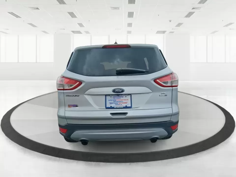 2015 Ford Escape SE (1FMCU9G91FU) with an 2.0L L4 DOHC 16V engine, 6-Speed Automatic transmission, located at 880 E. National Road, Vandalia, OH, 45377, (937) 908-9800, 39.891918, -84.183594 - Weekend getaways to Englewood MetroPark, snowy commutes down I75, and everyday school-and-grocery runs all feel easier when you've got an SUV that's sized right, confident in bad weather, and comfortable for the long haul. This **2015 Ford Escape SE 4WD** in **Ingot Silver** is a smart pick for driv - Photo#3