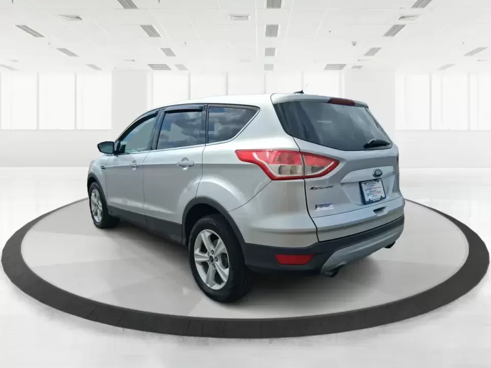 2015 Ford Escape SE (1FMCU9G91FU) with an 2.0L L4 DOHC 16V engine, 6-Speed Automatic transmission, located at 880 E. National Road, Vandalia, OH, 45377, (937) 908-9800, 39.891918, -84.183594 - Weekend getaways to Englewood MetroPark, snowy commutes down I75, and everyday school-and-grocery runs all feel easier when you've got an SUV that's sized right, confident in bad weather, and comfortable for the long haul. This **2015 Ford Escape SE 4WD** in **Ingot Silver** is a smart pick for driv - Photo#4