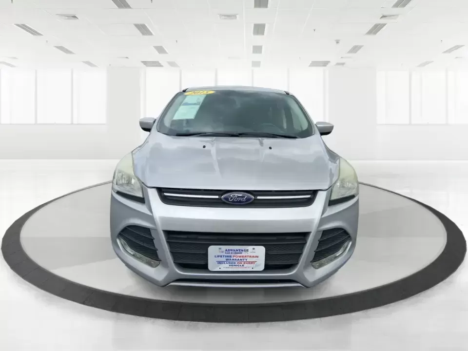 2015 Ford Escape SE (1FMCU9G91FU) with an 2.0L L4 DOHC 16V engine, 6-Speed Automatic transmission, located at 880 E. National Road, Vandalia, OH, 45377, (937) 908-9800, 39.891918, -84.183594 - Weekend getaways to Englewood MetroPark, snowy commutes down I75, and everyday school-and-grocery runs all feel easier when you've got an SUV that's sized right, confident in bad weather, and comfortable for the long haul. This **2015 Ford Escape SE 4WD** in **Ingot Silver** is a smart pick for driv - Photo#7