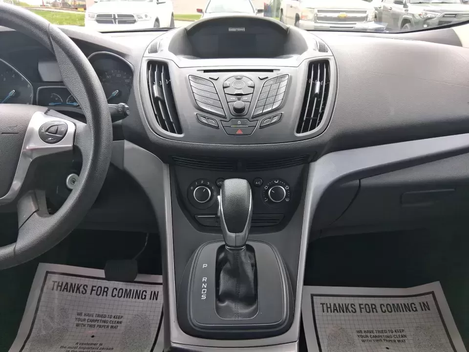 2015 Ford Escape SE (1FMCU9G91FU) with an 2.0L L4 DOHC 16V engine, 6-Speed Automatic transmission, located at 880 E. National Road, Vandalia, OH, 45377, (937) 908-9800, 39.891918, -84.183594 - Weekend getaways to Englewood MetroPark, snowy commutes down I75, and everyday school-and-grocery runs all feel easier when you've got an SUV that's sized right, confident in bad weather, and comfortable for the long haul. This **2015 Ford Escape SE 4WD** in **Ingot Silver** is a smart pick for driv - Photo#13