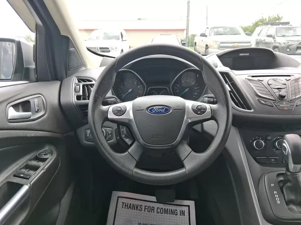 2015 Ford Escape SE (1FMCU9G91FU) with an 2.0L L4 DOHC 16V engine, 6-Speed Automatic transmission, located at 880 E. National Road, Vandalia, OH, 45377, (937) 908-9800, 39.891918, -84.183594 - Weekend getaways to Englewood MetroPark, snowy commutes down I75, and everyday school-and-grocery runs all feel easier when you've got an SUV that's sized right, confident in bad weather, and comfortable for the long haul. This **2015 Ford Escape SE 4WD** in **Ingot Silver** is a smart pick for driv - Photo#16