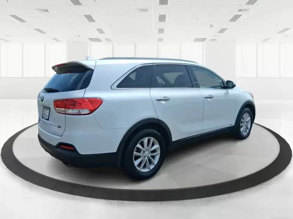 2016 Kia Sorento 2.4L LX (5XYPGDA34GG) with an 2.4L I-4 gasoline direct injection engine, 6-Speed Automatic transmission, located at 880 E. National Road, Vandalia, OH, 45377, (937) 908-9800, 39.891918, -84.183594 - Ready for school drop-offs, I-75 commutes, and spontaneous weekend getaways to the Dayton area-this 2016 Kia Sorento LX is the kind of SUV that fits real life. With confident AWD capability, flexible seating, and everyday comfort, it's a smart pick for growing families, shift workers with long drive - Photo#2