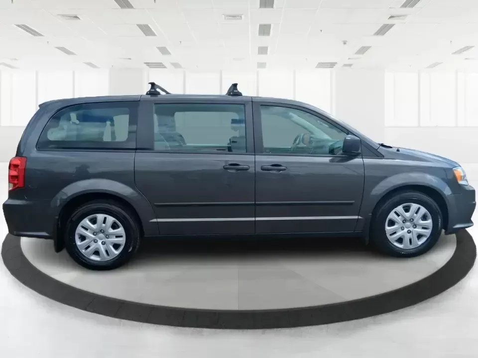 2015 Dodge Grand Caravan American Value Pkg (2C4RDGBG3FR) with an 3.6L V-6 DOHC engine, 6-Speed Automatic transmission, located at 4508 South Dixie Dr, Moraine, OH, 45439, (937) 908-9800, 39.689976, -84.218452 - Road trips to Caesar Creek, school drop-offs through Kettering, and everyday errands up and down South Dixie Drive feel a lot easier when you've got a spacious minivan that's built for real life. This **2015 Dodge Grand Caravan American Value Pkg** is a practical, family-focused van that fits busy s - Photo#1