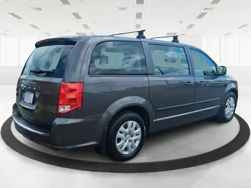 2015 Dodge Grand Caravan American Value Pkg (2C4RDGBG3FR) with an 3.6L V-6 DOHC engine, 6-Speed Automatic transmission, located at 4508 South Dixie Dr, Moraine, OH, 45439, (937) 908-9800, 39.689976, -84.218452 - Road trips to Caesar Creek, school drop-offs through Kettering, and everyday errands up and down South Dixie Drive feel a lot easier when you've got a spacious minivan that's built for real life. This **2015 Dodge Grand Caravan American Value Pkg** is a practical, family-focused van that fits busy s - Photo#2