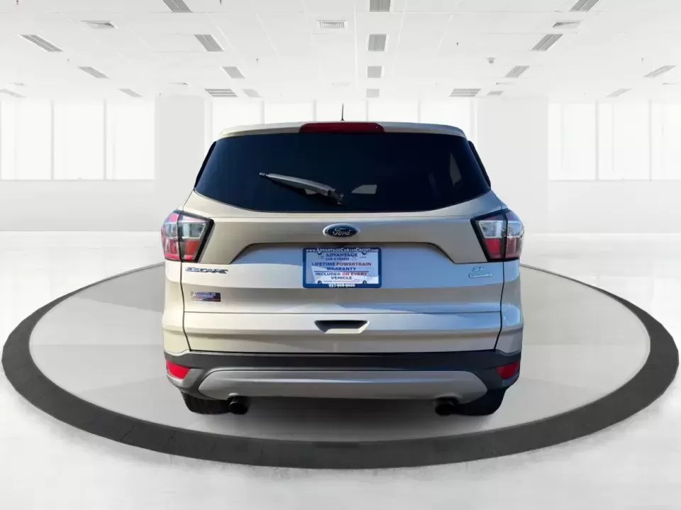 2018 Ford Escape SE (1FMCU0GD6JU) with an 1.5L L4 DOHC 16V engine, 6A transmission, located at 4508 South Dixie Dr, Moraine, OH, 45439, (937) 908-9800, 39.689976, -84.218452 - Pack up the kids, load the groceries, or point the nose toward a weekend getaway-this 2018 Ford Escape SE is the kind of compact SUV that fits real life in Moraine. With a comfortable cabin, smart tech, and easy-to-park size, it's ideal for long commutes up I75, quick errands along South Dixie Dr, o - Photo#3