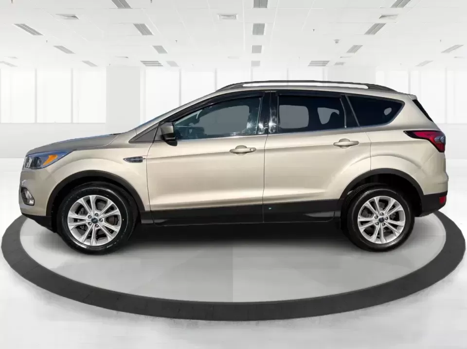 2018 Ford Escape SE (1FMCU0GD6JU) with an 1.5L L4 DOHC 16V engine, 6A transmission, located at 4508 South Dixie Dr, Moraine, OH, 45439, (937) 908-9800, 39.689976, -84.218452 - Pack up the kids, load the groceries, or point the nose toward a weekend getaway-this 2018 Ford Escape SE is the kind of compact SUV that fits real life in Moraine. With a comfortable cabin, smart tech, and easy-to-park size, it's ideal for long commutes up I75, quick errands along South Dixie Dr, o - Photo#5