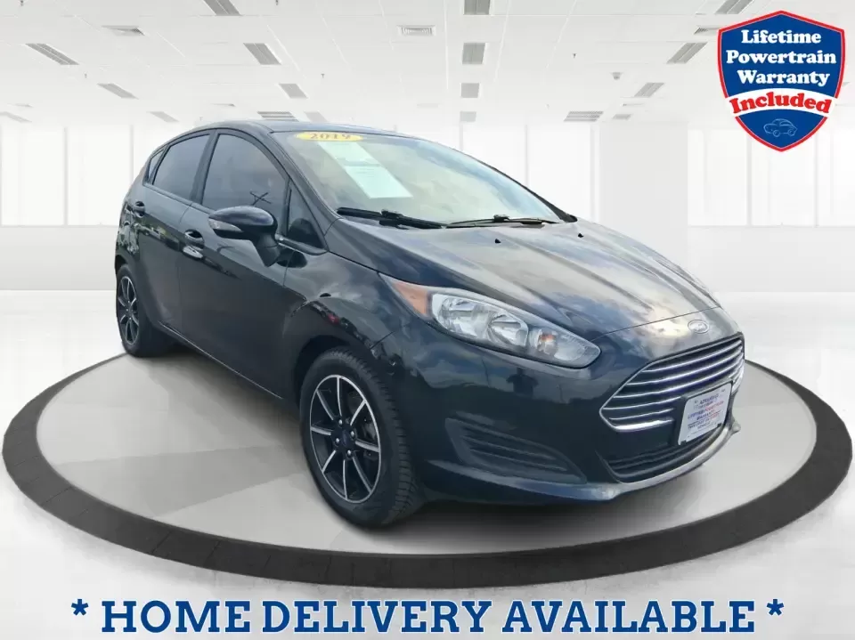 2019 Ford Fiesta SE (3FADP4EJ8KM) with an 1.6L I-4 DOHC engine, located at 401 Woodman Dr, Riverside, OH, 45431, (937) 908-9800, 39.760899, -84.123421 - Need a smart, easy-to-park hatchback for busy Riverside life-whether you're commuting down I-675, running errands near Wright-Patterson AFB, or squeezing into tight spots around The Greene in Beavercreek? This 2019 Ford Fiesta SE Hatchback in Shadow Black is built for real-world driving: efficient, - Photo#0