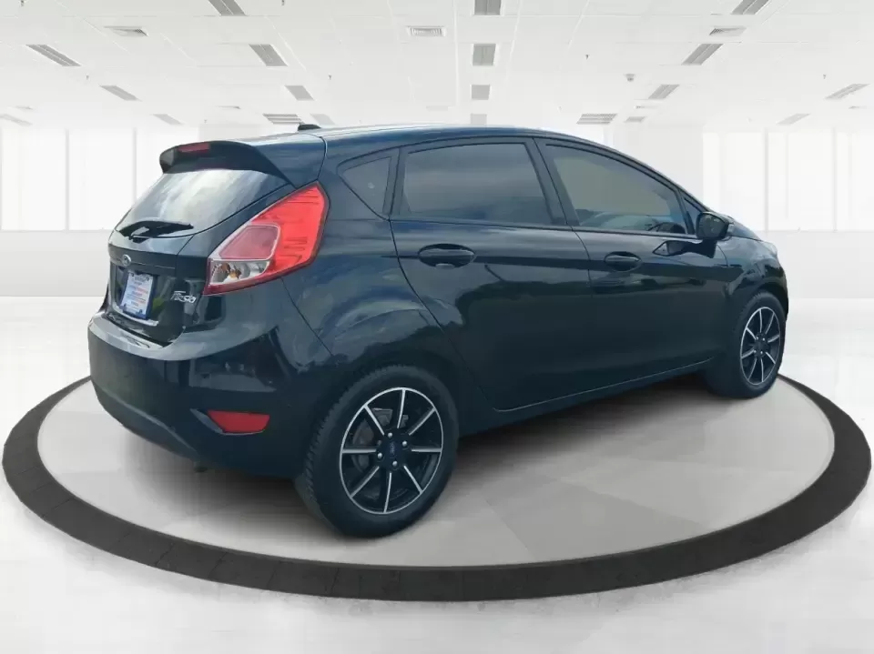 2019 Ford Fiesta SE (3FADP4EJ8KM) with an 1.6L I-4 DOHC engine, located at 401 Woodman Dr, Riverside, OH, 45431, (937) 908-9800, 39.760899, -84.123421 - Need a smart, easy-to-park hatchback for busy Riverside life-whether you're commuting down I-675, running errands near Wright-Patterson AFB, or squeezing into tight spots around The Greene in Beavercreek? This 2019 Ford Fiesta SE Hatchback in Shadow Black is built for real-world driving: efficient, - Photo#2