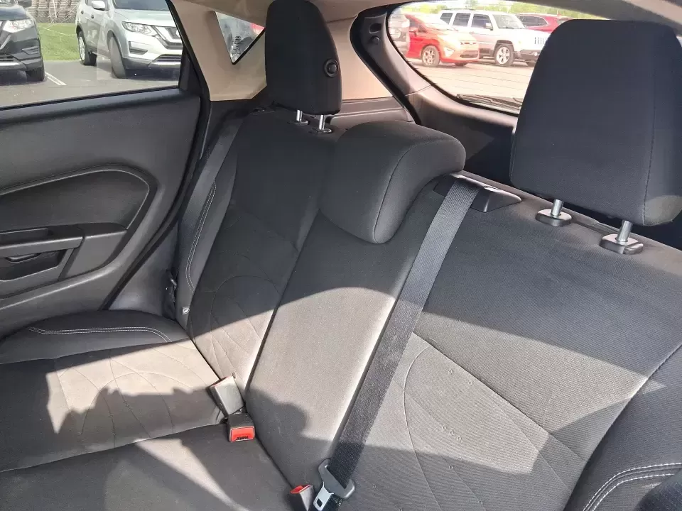 2019 Ford Fiesta SE (3FADP4EJ8KM) with an 1.6L I-4 DOHC engine, located at 401 Woodman Dr, Riverside, OH, 45431, (937) 908-9800, 39.760899, -84.123421 - Need a smart, easy-to-park hatchback for busy Riverside life-whether you're commuting down I-675, running errands near Wright-Patterson AFB, or squeezing into tight spots around The Greene in Beavercreek? This 2019 Ford Fiesta SE Hatchback in Shadow Black is built for real-world driving: efficient, - Photo#10