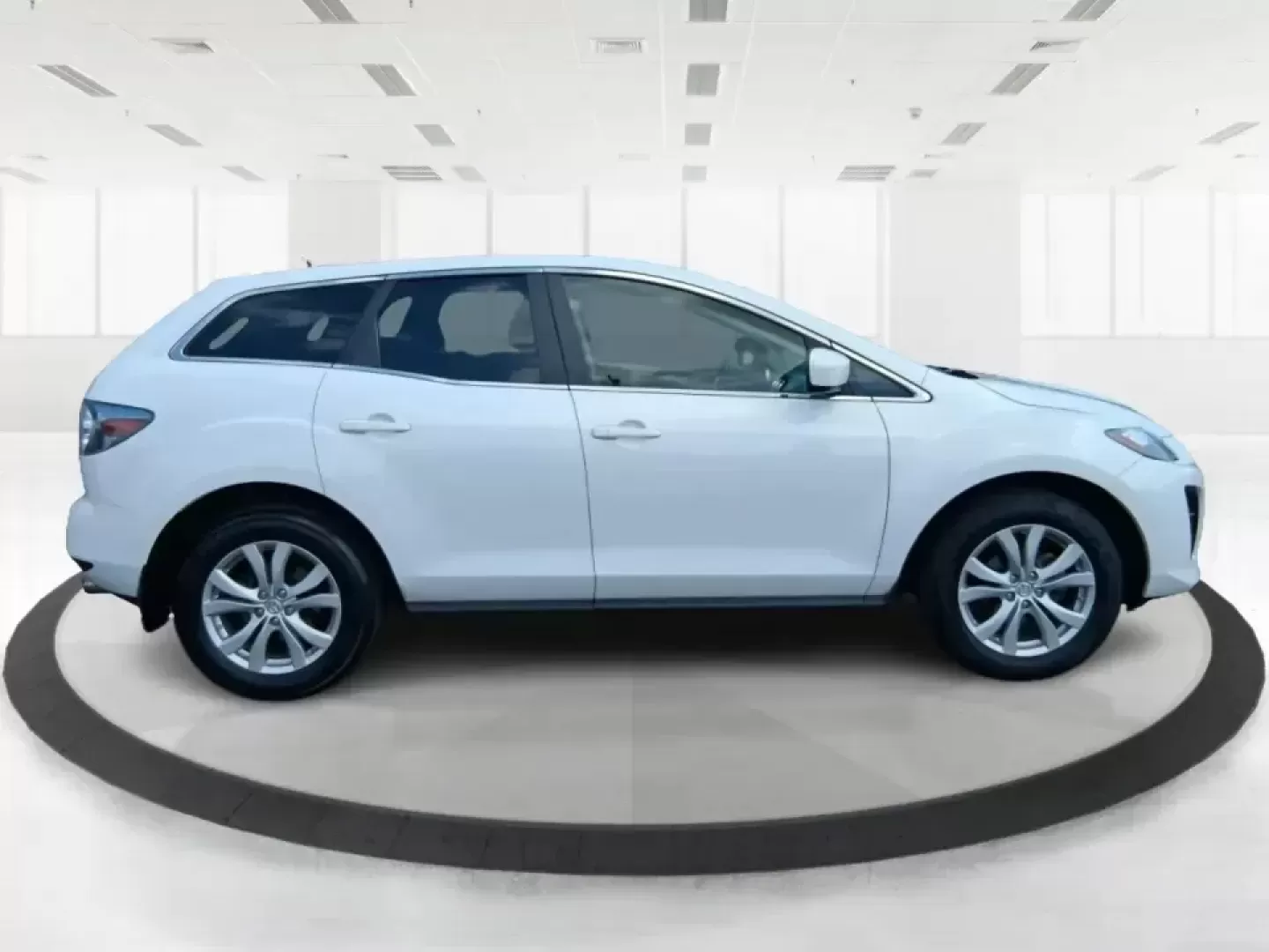 2010 Mazda CX-7 s Touring (JM3ER4W33A0) with an 2.3L I-4 gasoline direct injection engine, 6-Speed Automatic transmission, located at 8750 N County Rd 25A, Piqua, OH, 45356, (937) 908-9800, 40.164391, -84.232513 - Picture your next weekend: loading up the cargo area for a day at Miami County Park, cruising up I75 for a quick getaway, or confidently handling Ohio's surprise rain and winter slush on the school run. This 2010 Mazda CX7 s Touring is the kind of sporty, practical SUV that fits real life in Troy-ea - Photo#1