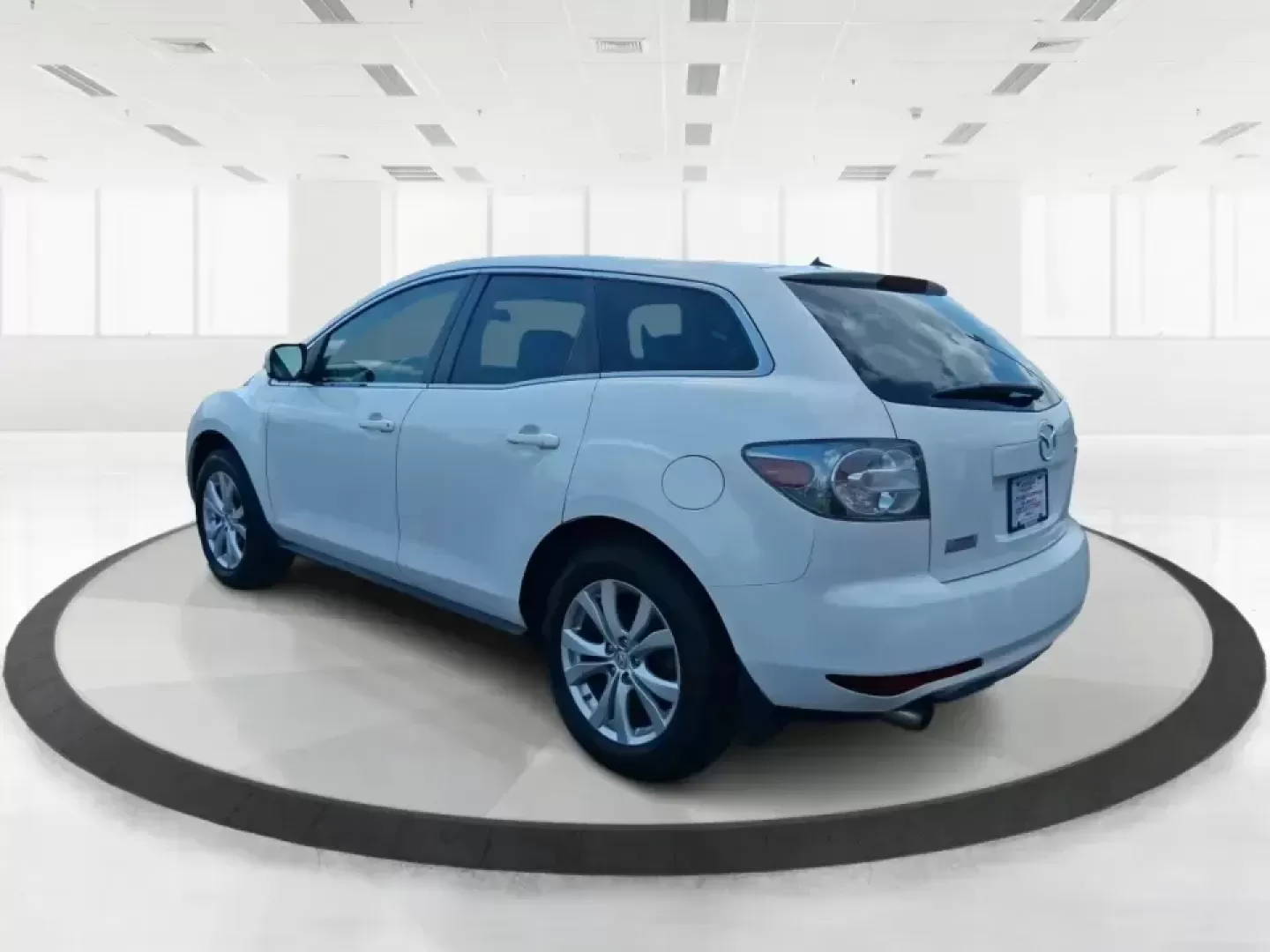2010 Mazda CX-7 s Touring (JM3ER4W33A0) with an 2.3L I-4 gasoline direct injection engine, 6-Speed Automatic transmission, located at 8750 N County Rd 25A, Piqua, OH, 45356, (937) 908-9800, 40.164391, -84.232513 - Picture your next weekend: loading up the cargo area for a day at Miami County Park, cruising up I75 for a quick getaway, or confidently handling Ohio's surprise rain and winter slush on the school run. This 2010 Mazda CX7 s Touring is the kind of sporty, practical SUV that fits real life in Troy-ea - Photo#4