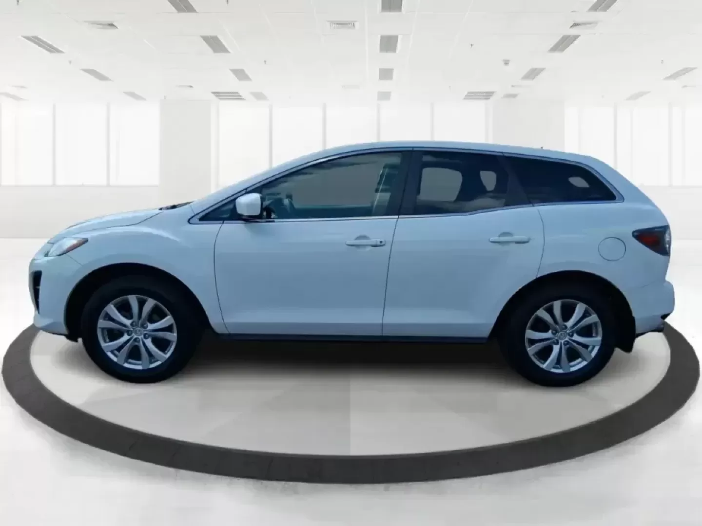 2010 Mazda CX-7 s Touring (JM3ER4W33A0) with an 2.3L I-4 gasoline direct injection engine, 6-Speed Automatic transmission, located at 8750 N County Rd 25A, Piqua, OH, 45356, (937) 908-9800, 40.164391, -84.232513 - Picture your next weekend: loading up the cargo area for a day at Miami County Park, cruising up I75 for a quick getaway, or confidently handling Ohio's surprise rain and winter slush on the school run. This 2010 Mazda CX7 s Touring is the kind of sporty, practical SUV that fits real life in Troy-ea - Photo#5