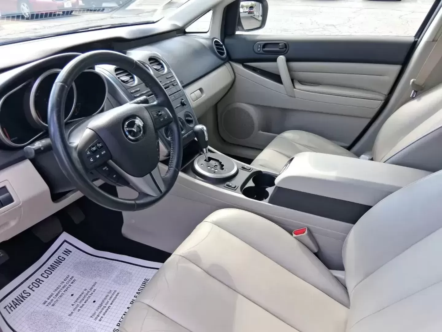 2010 Mazda CX-7 s Touring (JM3ER4W33A0) with an 2.3L I-4 gasoline direct injection engine, 6-Speed Automatic transmission, located at 8750 N County Rd 25A, Piqua, OH, 45356, (937) 908-9800, 40.164391, -84.232513 - Picture your next weekend: loading up the cargo area for a day at Miami County Park, cruising up I75 for a quick getaway, or confidently handling Ohio's surprise rain and winter slush on the school run. This 2010 Mazda CX7 s Touring is the kind of sporty, practical SUV that fits real life in Troy-ea - Photo#9