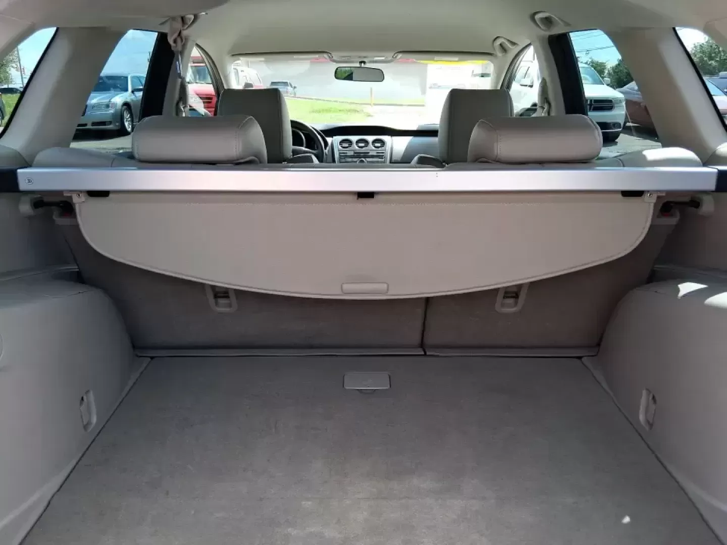 2010 Mazda CX-7 s Touring (JM3ER4W33A0) with an 2.3L I-4 gasoline direct injection engine, 6-Speed Automatic transmission, located at 8750 N County Rd 25A, Piqua, OH, 45356, (937) 908-9800, 40.164391, -84.232513 - Picture your next weekend: loading up the cargo area for a day at Miami County Park, cruising up I75 for a quick getaway, or confidently handling Ohio's surprise rain and winter slush on the school run. This 2010 Mazda CX7 s Touring is the kind of sporty, practical SUV that fits real life in Troy-ea - Photo#12