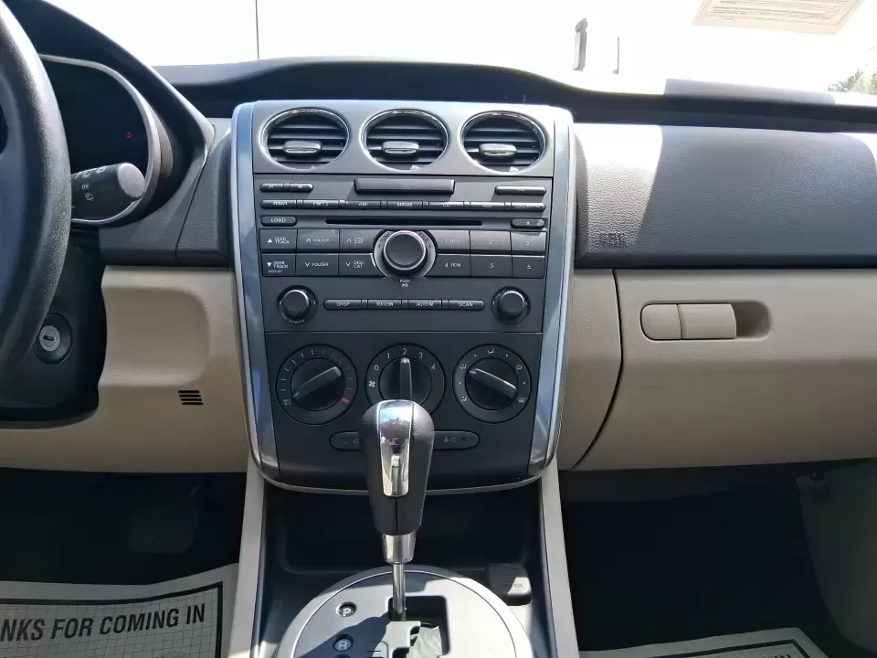 2010 Mazda CX-7 s Touring (JM3ER4W33A0) with an 2.3L I-4 gasoline direct injection engine, 6-Speed Automatic transmission, located at 1099 N County Rd 25A , Troy, OH, 45373, (937) 908-9800, 40.057079, -84.212883 - Picture your next weekend: loading up the cargo area for a day at Miami County Park, cruising up I75 for a quick getaway, or confidently handling Ohio's surprise rain and winter slush on the school run. This 2010 Mazda CX7 s Touring is the kind of sporty, practical SUV that fits real life in Troy-ea - Photo#13