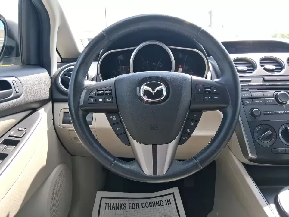 2010 Mazda CX-7 s Touring (JM3ER4W33A0) with an 2.3L I-4 gasoline direct injection engine, 6-Speed Automatic transmission, located at 1099 N County Rd 25A , Troy, OH, 45373, (937) 908-9800, 40.057079, -84.212883 - Picture your next weekend: loading up the cargo area for a day at Miami County Park, cruising up I75 for a quick getaway, or confidently handling Ohio's surprise rain and winter slush on the school run. This 2010 Mazda CX7 s Touring is the kind of sporty, practical SUV that fits real life in Troy-ea - Photo#16