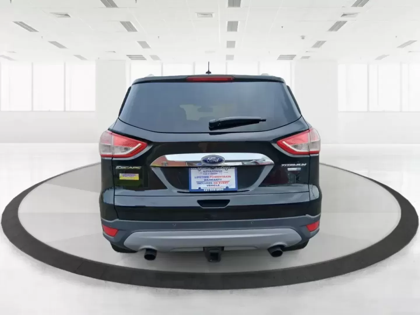 2014 Ford Escape Titanium (1FMCU9J99EU) with an 2.0L L4 DOHC 16V engine, 6-Speed Automatic transmission, located at 1099 N County Rd 25A , Troy, OH, 45373, (937) 908-9800, 40.057079, -84.212883 - Need one SUV that can handle an Ohio winter commute, school drop-offs, and a spontaneous weekend road trip to Hocking Hills without feeling like a compromise? This 2014 Ford Escape Titanium 4WD in sleek Tuxedo Black is built for real life in Troy-comfortable for long drives, confident in bad weather - Photo#3