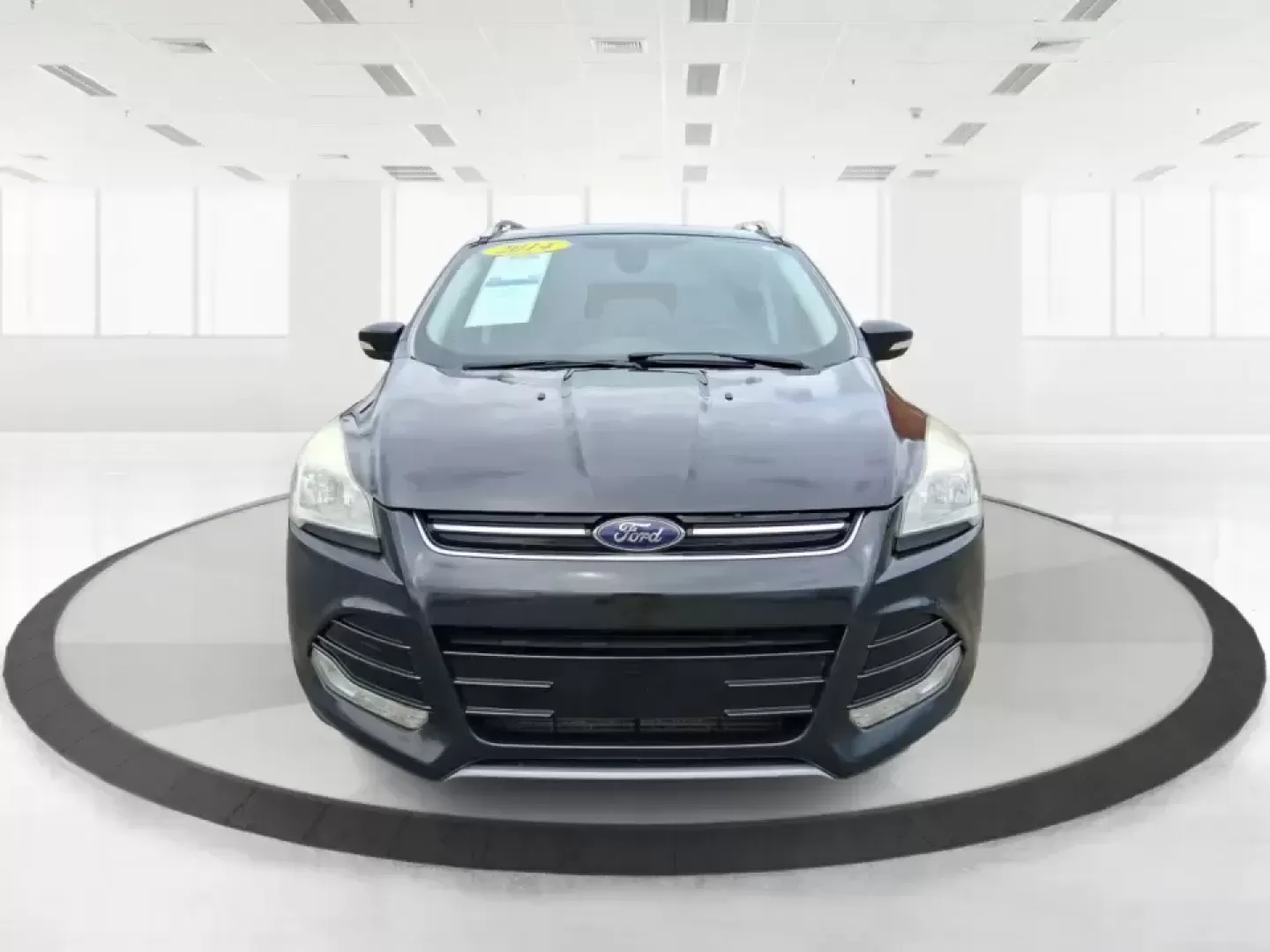 2014 Ford Escape Titanium (1FMCU9J99EU) with an 2.0L L4 DOHC 16V engine, 6-Speed Automatic transmission, located at 1099 N County Rd 25A , Troy, OH, 45373, (937) 908-9800, 40.057079, -84.212883 - Need one SUV that can handle an Ohio winter commute, school drop-offs, and a spontaneous weekend road trip to Hocking Hills without feeling like a compromise? This 2014 Ford Escape Titanium 4WD in sleek Tuxedo Black is built for real life in Troy-comfortable for long drives, confident in bad weather - Photo#7