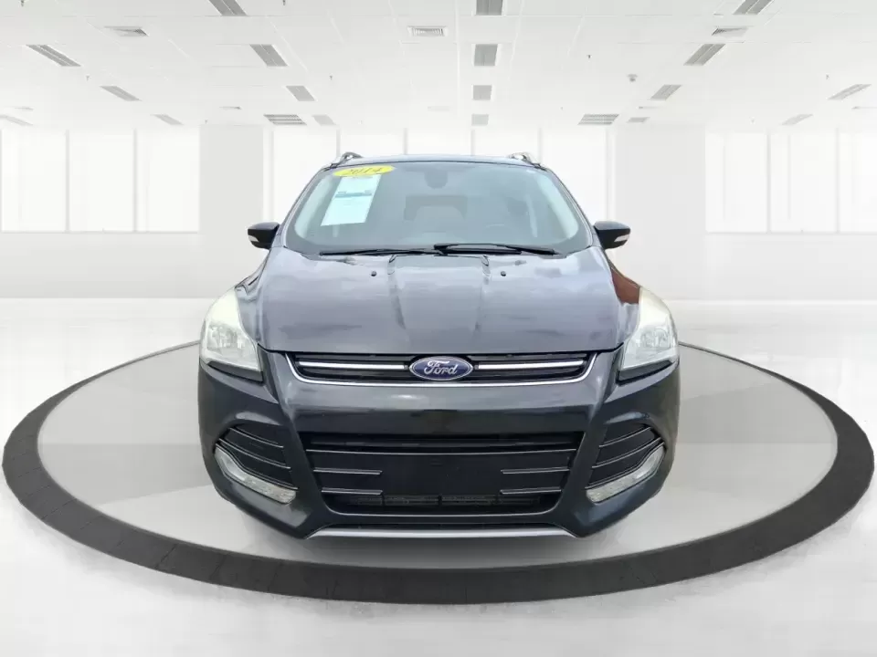 2014 Ford Escape Titanium (1FMCU9J99EU) with an 2.0L L4 DOHC 16V engine, 6-Speed Automatic transmission, located at 1099 N County Rd 25A , Troy, OH, 45373, (937) 908-9800, 40.057079, -84.212883 - Need one SUV that can handle an Ohio winter commute, school drop-offs, and a spontaneous weekend road trip to Hocking Hills without feeling like a compromise? This 2014 Ford Escape Titanium 4WD in sleek Tuxedo Black is built for real life in Troy-comfortable for long drives, confident in bad weather - Photo#7