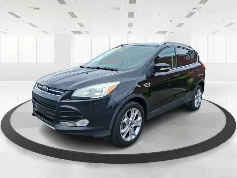 2014 Ford Escape Titanium (1FMCU9J99EU) with an 2.0L L4 DOHC 16V engine, 6-Speed Automatic transmission, located at 1099 N County Rd 25A , Troy, OH, 45373, (937) 908-9800, 40.057079, -84.212883 - Need one SUV that can handle an Ohio winter commute, school drop-offs, and a spontaneous weekend road trip to Hocking Hills without feeling like a compromise? This 2014 Ford Escape Titanium 4WD in sleek Tuxedo Black is built for real life in Troy-comfortable for long drives, confident in bad weather - Photo#8